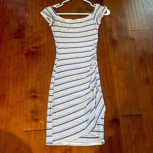 Soprano small, body hugging dress.